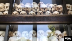 Skulls of victims from the Khmer Rouge period are kept at Choeung Ek killing fields in Phnom Penh, Cambodia. (Sun Narin/VOA Khmer) 
