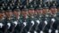 Soldiers of People's Liberation Army march in formation past Tiananmen Square during the military parade marking the 70th founding anniversary of People's Republic of China, on its National Day in Beijing, Oct. 1, 2019.