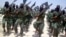 FILE - Al-Shabab fighters conduct exercises on the outskirts of Mogadishu, Somalia, Feb. 17, 2011.
The U.S. military said it conducted an airstrike Dec. 15, 2018, near Gandarhse, south of Mogadishu, that killed at least eight al-Shabab militants.