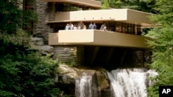 FILE - This Aug. 23, 2007 file photo shows Fallingwater, one of the late architect Frank Lloyd Wright's best-known works, which was built out over a waterfall in Bear Run, Pa. 