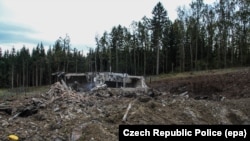 A photo provided by the Police of the Czech Republic shows a damaged private ammunition depot near Vrbetice, eastern Moravia, December 11, 2014.