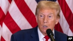 Trump Columnist Lawsuit