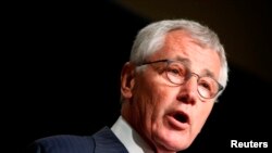 FILE - U.S. Defense Secretary Chuck Hagel is expected to soon decide whether to subject all U.S. troops returning from Ebola response efforts to a "quarantine-like" period.