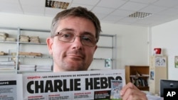 Fransuz satirik gazetasiga qonli hujum 