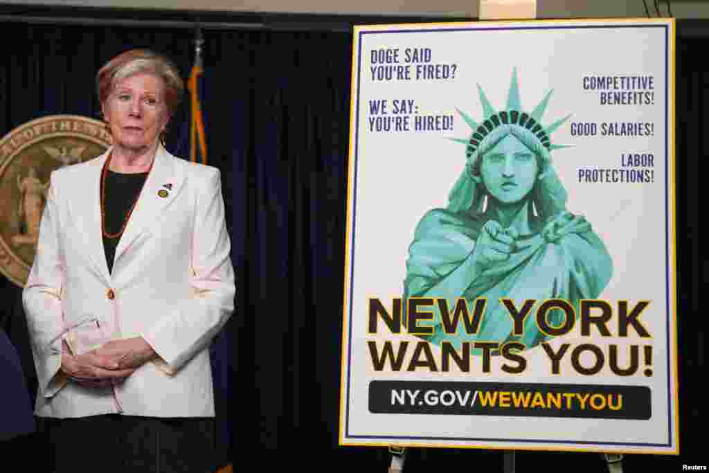 New York State Department of Labor Commissioner Roberta Reardon stands next to a billboard during a press conference held by Governor Kathy Hochul to introduce a new initiative titled "New York Wants You," a program designed to recruit and employ displaced federal workers across New York State.