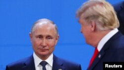 
El presidente de los Estados Unidos, Donald Trump, y el presidente de Rusia, Vladimir Putin, serán vistos durante la cumbre de líderes del G20 en Buenos Aires, Argentina.