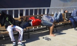 Young men and boys sleep on park benches in Izmir, Turkey, April 13, 2020. (Photo courtesy of refugees)