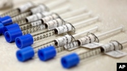 FILE - Syringes filled with the opioid painkiller fentanyl are shown in an inpatient pharmacy, June 1, 2018. 