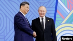 Չինաստանի ու Ռուսաստանի նախագահներ Սի Ծինփինն ու Վլադիմիր Պուտինը։ Կազան, Ռուսաստան, հոկտեմբերի 23, 2024թ․։