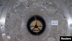 A giant magnet with a magnetic field of 11.7 T. is seen at the Neurospin facility of the CEA Saclay Nuclear Research Center, near Paris, France, Sept. 7, 2019.