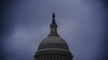 FILE - The light in the cupola of the Capitol Dome signals that the Senate remains in session overnight, in Washington, Oct. 25, 2020.