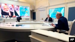 Путін вперше вживав слово “війна” замість кремлівського терміну “спеціальна військова операція”, під час віртуального саміту Групи 20. 22 листопада, 2023р. Mikhail Klimentyev, Sputnik via AP
