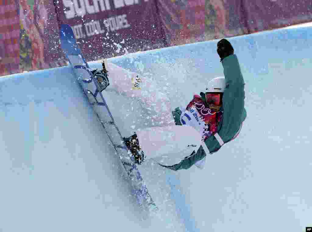 Australia's Holly Crawford competes in the women's snowboard half pipe at the Rosa Khutor Extreme Park, in Krasnaya Polyana, Feb. 12, 2014.