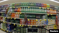 A marketplace full of soft drinks.