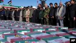 تابوت‌های قربانیان حملات انتحاری در شهر کرمان ایران