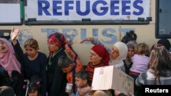 ፋይል ፎቶ - ስደተኞች በግሪክ ማቆደንያ ድንበር እ.አ.አ. 2016