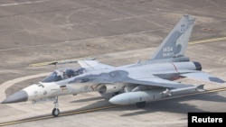 FILE - An F-CK-1 Ching-kuo Indigenous Defense Fighter is seen at an air force base in Tainan, Taiwan, Jan. 26, 2021. 