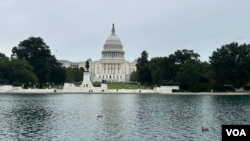 美国国会大厦及倒影池。(2025年9月30日)