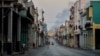 Rue quasi-déserte à La Havane, le 25 mars 2020, en raison du confinement obligatoire pour éviter la propagation du coronavirus. (Photo Yamil Lage/AFP)