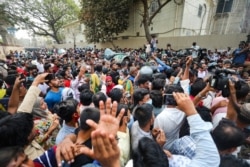FILE - Activists shout slogans during a protest against the Digital Security Act (DSA), in Dhaka on March 3, 2021.