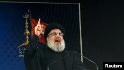 ཧི་ཛི་བྷུ་ལཱ་ཤོག་གི་སྤྱི་ཁྱབ་དྲུང་ཆེ་ཧ་སན་ན་སི་རེ་ལཱ་བསད་