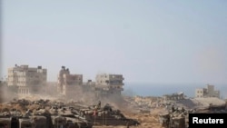 Izraelski vojnici i tenkovi na položajima u Pojasu Gaze, 5. novembra 2023. (Foto: Rojters/IDF)