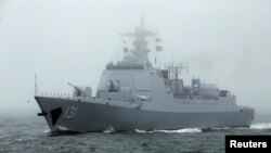 FILE - Chinese Navy's destroyer Taiyuan takes part in a naval parade off the eastern port city of Qingdao, to mark the 70th anniversary of the founding of Chinese People's Liberation Army Navy, China, April 23, 2019. (REUTERS/Jason Lee)
