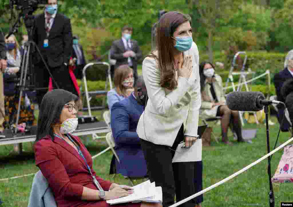 CNN White House correspondent Kaitlan Collins tries to ask her question of U.S. President Donald Trump after he called on her on the heels of an exchange with CBS News correspondent Weijia Jiang (L) during a coronavirus disease (COVID-19) outbreak&nbsp;response briefing at the White House in Washington, May 11, 2020. The president refused to hear Collins' question, then ended and left the news conference.