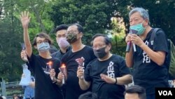 前支聯會主席李卓人(右一)及前副主席何俊仁(右二)被控”煽動顛覆國家政權罪”。(美國之音 湯惠芸)