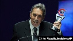 Reitman accepting an award at CinemaCon in 2014. (Photo by Chris Pizzello/Invision/AP)
