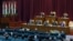 FILE - Libyan parliament meets to discuss approving new government, in Sirte, March 8, 2021.