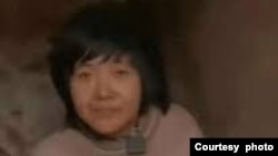 中國徐州豐縣被鎖鏈栓住的八孩媽媽。