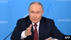 Putin na sastanku u Ministarstvu spoljnih poslova u Moskvi (NATALIA KOLESNIKOVA / AFP)