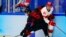 China's Wei Ruike (Ethan Werek) (61) is checked by Canada's Morgan Ellis (5) during a men's qualification round hockey game at the 2022 Winter Olympics, Feb. 15, 2022, in Beijing.