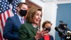 House Speaker Nancy Pelosi, D-Calif., with Rep. Eric Swalwell, D-Calif., and Rep. Barbara Lee, D-Calif., holds a news conference at the Capitol in Washington, Feb. 23, 2022, where she condemned Russian President Vladimir Putin for his aggression in Ukraine.