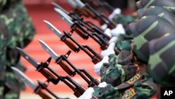 Diễn hành chiến thắng 30 tháng Tư tại Việt Nam. (AP Photo/Dita Alangkara)