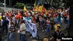 Opposition supporters take part in a protest against upcoming presidential elections, in Caracas, Venezuela, May 16, 2018. (REUTERS/Marco Bello)