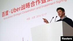 Uber CEO Travis Kalanick speaks during the Baidu and Uber strategic cooperation and investment signing ceremony at Baidu's headquarters in Beijing.