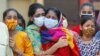 Porodica preminulog od Kovida 19 u Indiji