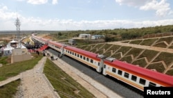 A general view shows a train on the Standard Gauge Railway line constructed by the China Road and Bridge Corporation and financed by Chinese government in Kenya, Oct. 16, 2019. 