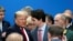 U.S. President Donald Trump talks with Canada's Prime Minister Justin Trudeau during a North Atlantic Treaty Organization Plenary Session at the NATO summit in Watford, near London, Britain, Dec. 4, 2019.