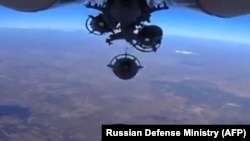 The Russian Defense Ministry says Russian aircraft dropped bombs on Islamic State positions in Syria. 