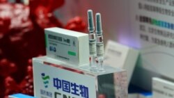 FILE - A booth displaying a coronavirus vaccine candidate from China National Biotech Group is seen at the 2020 China International Fair for Trade in Services, following the COVID-19 outbreak, in Beijing, China, Sept. 5, 2020. (Reuters)