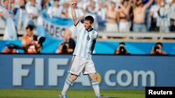 Argentina's Lionel Messi celebrates after scoring against Iran during their 2014 World Cup Group F soccer match at the Mineirao stadium in Belo Horizonte June 21, 2014.