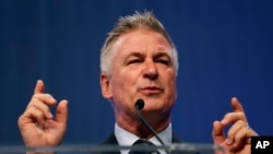 FILE - Actor Alec Baldwin speaks during the Iowa Democratic Party's fall gala, in Des Moines, Iowa, Nov. 27, 2017. 