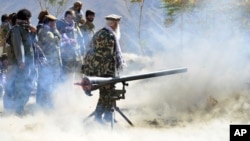Militiamen loyal to Ahmad Massoud, son of the late Ahmad Shah Massoud, take part in a training exercise, in Panjshir province, northeastern Afghanistan, Aug. 30, 2021.