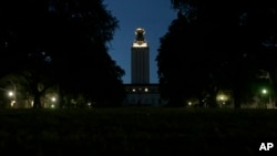 A nighttime view of the University of Texas campus in Austin.