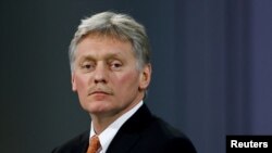 FILE PHOTO: Kremlin spokesman Dmitry Peskov attends an annual end-of-year news conference of Russian President Vladimir Putin in Moscow