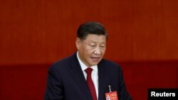 Rais wa China Xi Jinping akihutubia mkutano wa 20 wa chama cha Kikomunisti cha China