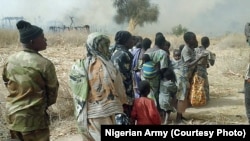 Sojojin Najeriya sun ceto wasu mutane a bayan da suka fatattaki 'yan Boko Haram daga wani sansaninsu dake dajin Sambisa a Jihar Borno